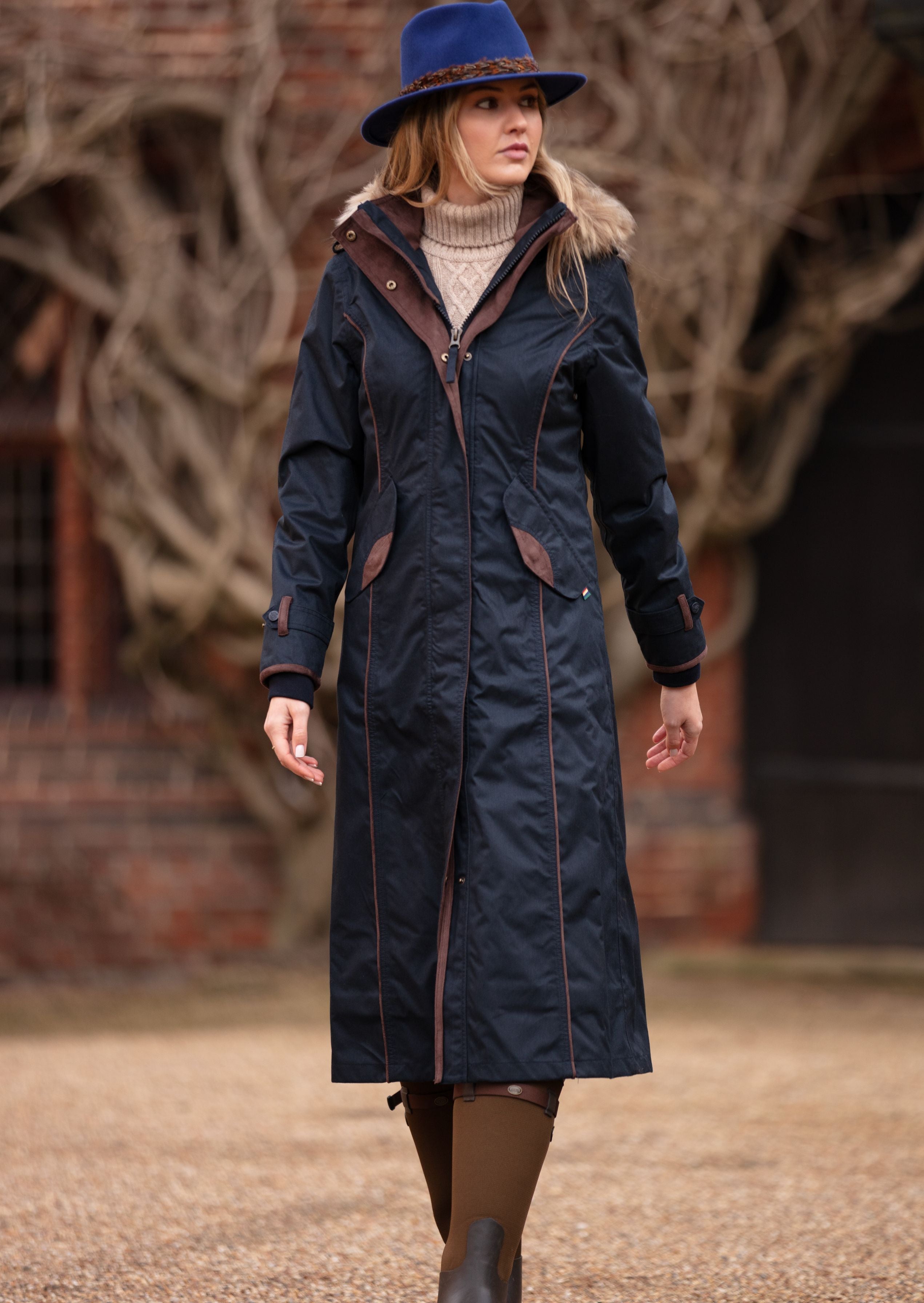 Ladies knee length on sale waterproof coat with hood